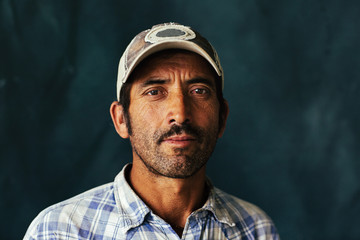Studio portrait of construction worker