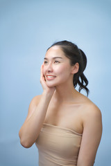 Obraz premium attractive asian woman skin care image on white background