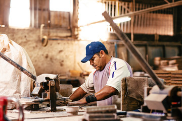 Man working in tile factory in Mexico