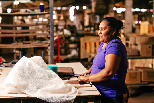 Woman working in tile factory