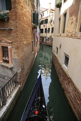 Fototapeta na wymiar Gondola in the canl, Venice, Italy