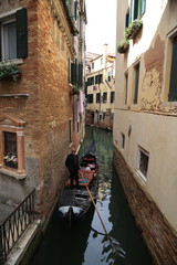 Fototapeta na wymiar Gondola in the canl, Venice, Italy