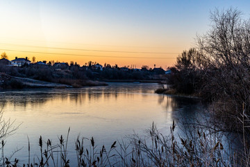 A frozen lake photographed in the early morning