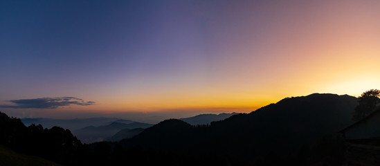 Fototapeta na wymiar sunrise over the Himalayas, Tirthan Valley, Himachal Pradesh