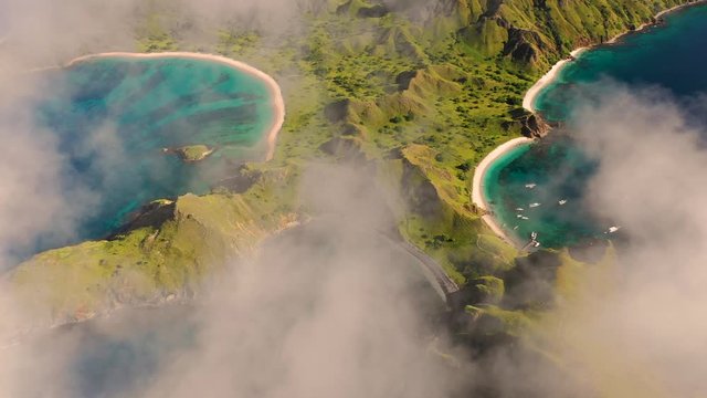 Scenic aerial view over the clouds of Padar islands during day, Indonesia.