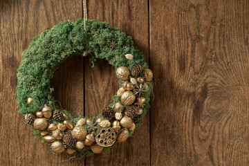 Eco-friendly green wreath with gold