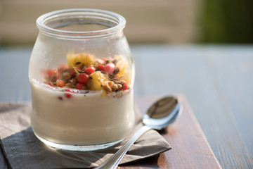 Yogurt with berries close up