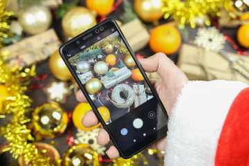 Joyful time and Santa Claus photographs prepared gifts for children