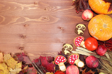 Thanksgiving, autumn background with seasonal autumn nature berries, pumpkins, apples and flowers on a wooden background, copy space, happy thanksgiving concept,