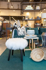 Blue Velvet Couch and White Faux Fur Stool