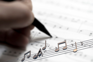 Hand With Pen And Music Sheet - Musical Background