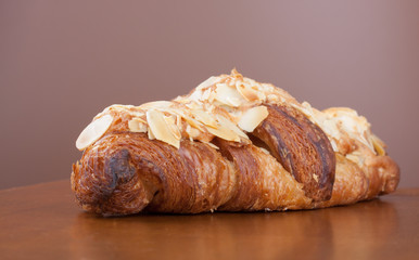 Fresh delicious Almond crescent on wood table