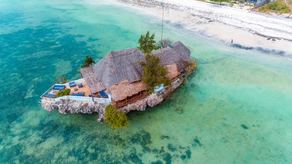 Rock Restaurant over the sea in Zanzibar, Tanzania, Africa. - obrazy, fototapety, plakaty