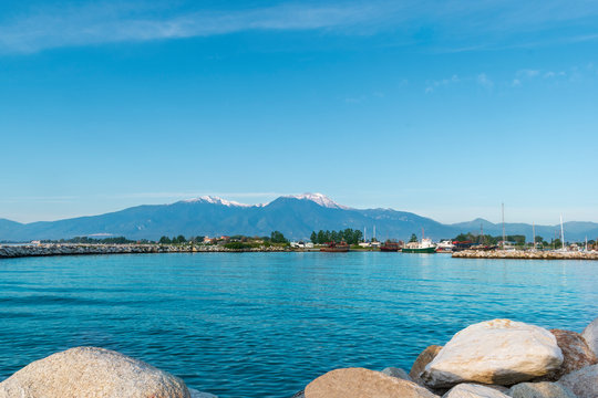 Katerini Paralia, Pieria, Greece. Beautiful bay in the Aegean Sea and a view of Mount Olympus in the background.