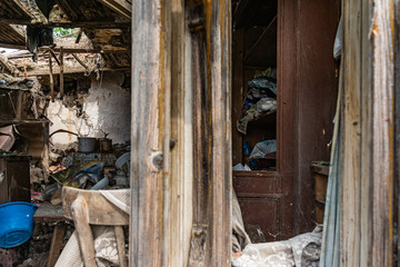 Abandoned home. Damaged house after earthquake.