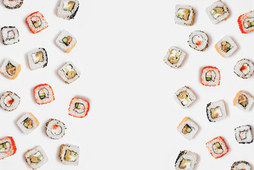 Obraz premium Japanese rolls on hite background.