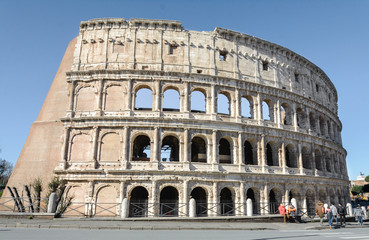 Fototapeta na wymiar The Colosseum is a symbol of the strength, power and history of Rome. The most beautiful and largest stadium in the ancient world. Built in the first century AD as an amphitheater
