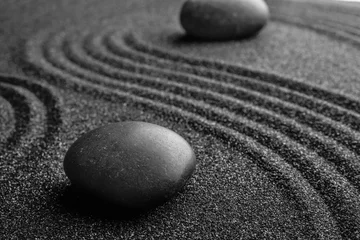 Poster Zwart zand met stenen en mooi patroon. Zen-concept © New Africa