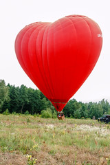 Obraz premium Heart shaped balloon soars in the sky