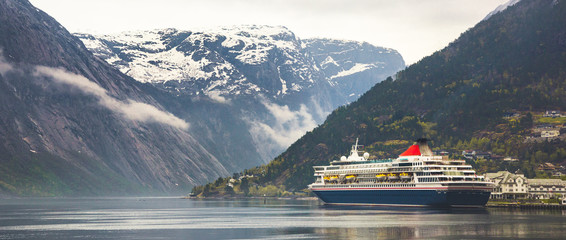 Norwegian fjord with cruise ship