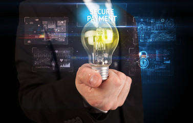 Businessman holding lightbulb with SECURE PAYMENT inscription, online security idea concept