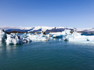 Fototapeta na wymiar Floating ice floes on the lake