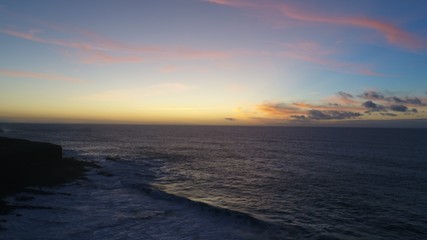Contemplating the force of the sea and the sunset from a wonderful place