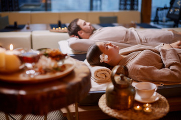 young man and woman, couple in love relaxing together at spa salon, after enjoying treatment, health and body care, holiday weekend