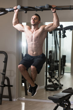 Male Athlete Doing Pull Ups