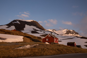 Red norwegian cabin at golden hour