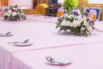 Flower decorations on the table in the lounge of the hotel.