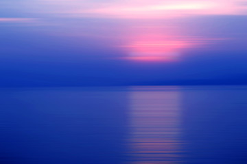 Obraz premium Abstract background motion blur sunset on the sea