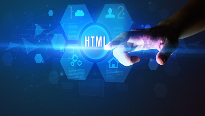 Hand touching HTML inscription, new technology concept