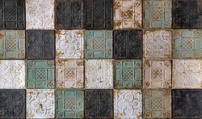 Rustic looking pressed tin antique ceiling tiles with oriental pattern, a beautiful background