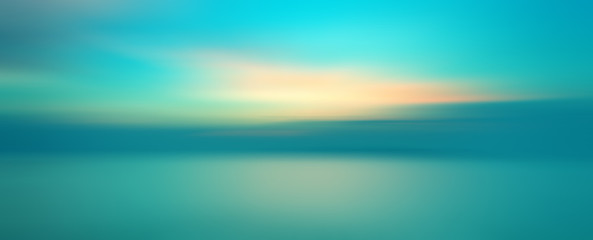 Motion blurred background of sunset on the sea