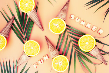 summer concept background with cone and juice oranges