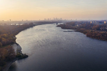 Drone photo of Vistula River in Warsaw, Poland - view from Siekierki district with city centre on a background