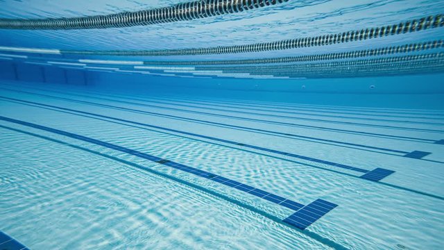 Swimming pool under water background.