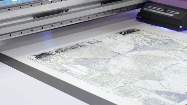 Industrial sublimation printer for digital printing on fabrics. Modern textile industry.
