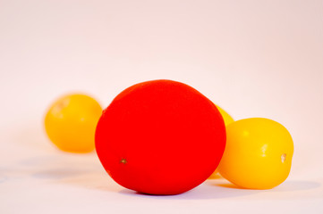 composition with ripe delicious red and black tomatoes