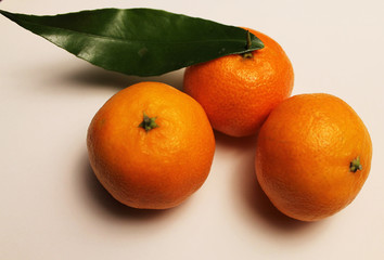 fresh tangerines isolated on white background