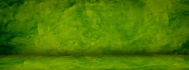 Green grunge cement Christmas background with vintage texture studio and showroom concrete banner...