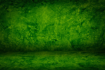 Green grunge cement Christmas background with vintage texture studio and showroom concrete to...