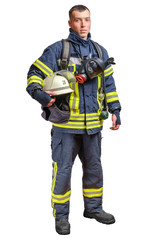 A young brave fireman in a fireproof uniform stands and looks at the camera with a helmet in his hands.