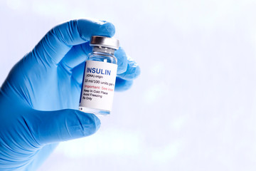 Insulin Vial In Hand - obrazy, fototapety, plakaty