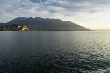 Scenic view of the Lake Maggiore at sunset on ferry boat cruising Luino to Stresa, Piedmont, Italy