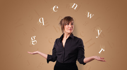 Young student juggle with letters