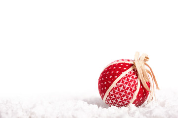 New Year Ball on snow isolated on white background. Winter holidays
