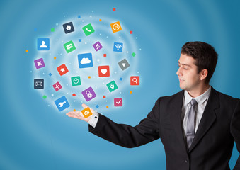 Young person presenting new application icons and symbols