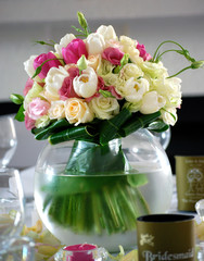 Wedding Reception Flowers of Roses and Tulips in Round Glass Vase. Wedding Flowers.
